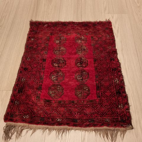 Håndknyttet persisk teppe