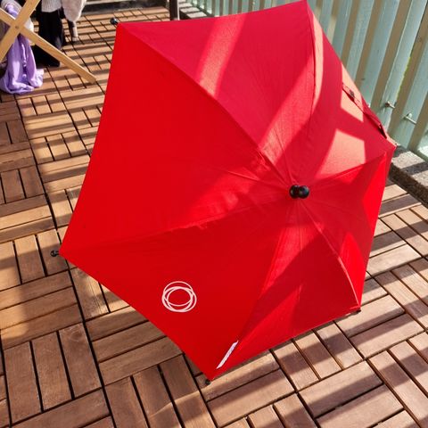 Rød bugaboo parasoll