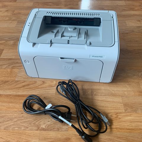 HP Laserjet P1005 sort-hvit printer +Ekstra toner.
