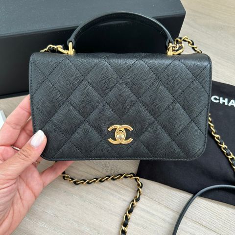 Chanel small flapbag with top handle