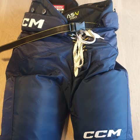 Pent brukt CCM ASV Pro bukse marine blå i størrelse senior medium
