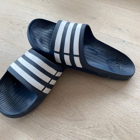 Adidas slides in navy