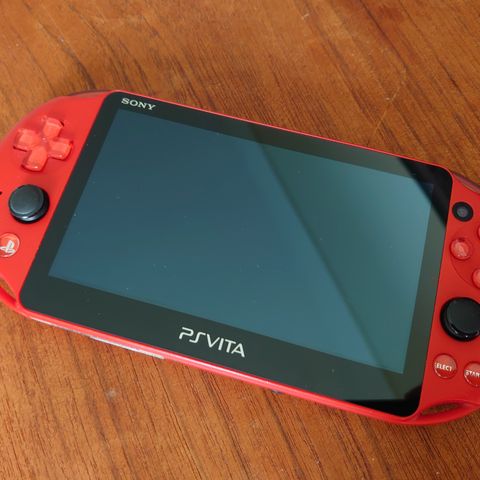 Sjelden og strøken metallic red slim utgave av PS Vita (PCH-2000)