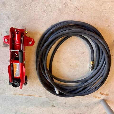 Small floor jack and air hose