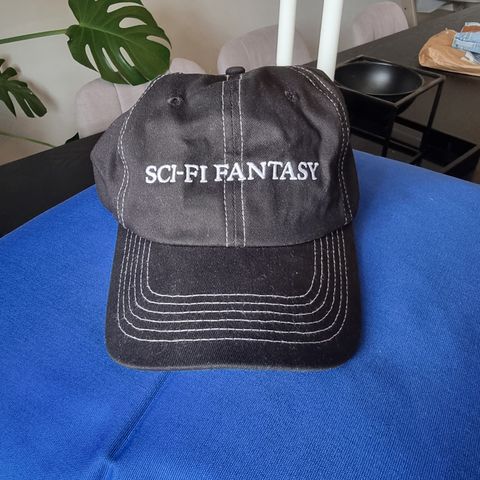 Sci-fi fantasy logo caps.