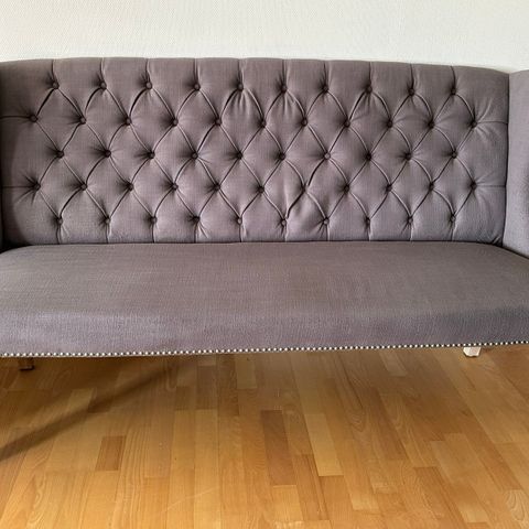 Selger en elegant kjøkken sofa