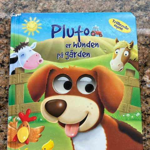 Pluto er hunden på gården