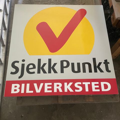 Sjekkpunkt bilverksted skilt