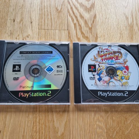 Playstation 2 spill selges (Street Fighter, God of War og CDS2)