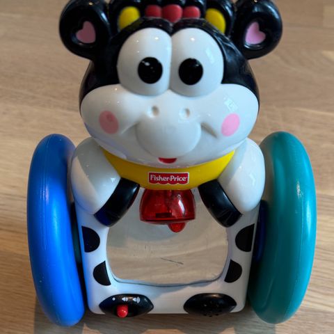 Fisher Price syngende og rullende ku