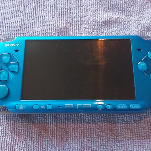 PSP 3004 Vibrant blue 6 fysiske spill og 2 fysiske filmer