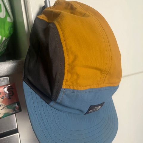 The North Face caps