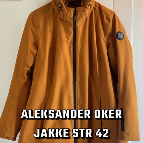 Okerfarget Aleksander jakke str 42 selges