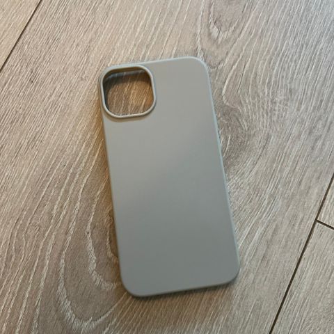 Ubrukt beige deksel til iPhone 13