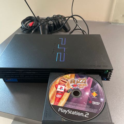 PS2 - går på og lyser, med fungerende diskskuff.