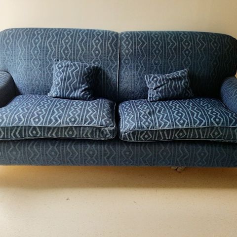 Blå stoff sofa