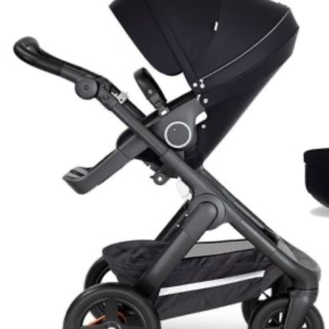 Stokke trailz med regntrekk, Nordlys håndvarmere og sort fårskinn til sittdelen