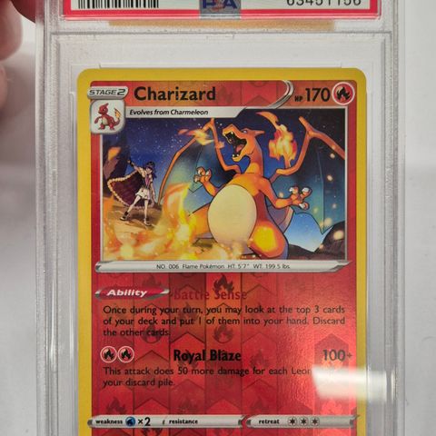 Charizard reverse foil Psa 9