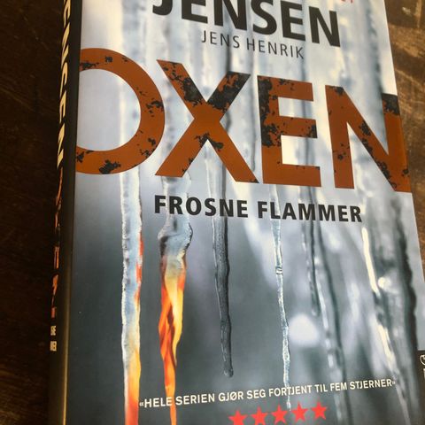 Oxen Frosne flammer. Krimroman av Jens Henrik Jensen