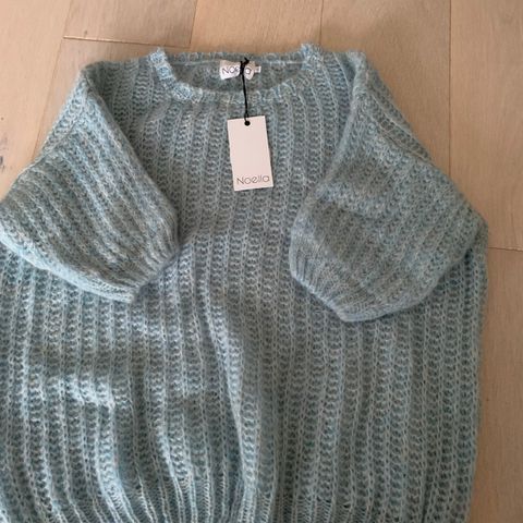 Noella Roy short jumper