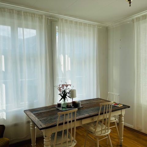 2 pairs of white curtains