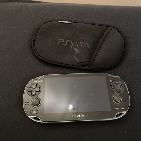 Playstation vita, med lader og etui selges sammlet