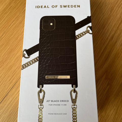 Ideal of Sweden. Jet Black croco phone necklace case