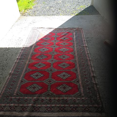 handlaget persisk teppe
