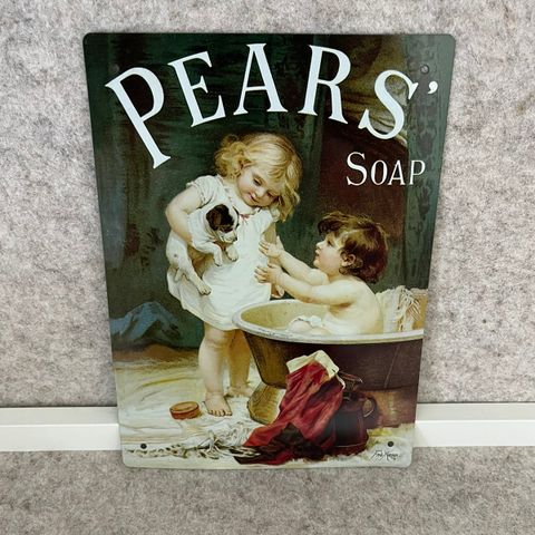 Replika av en gammel reklame for Pears soap i metall