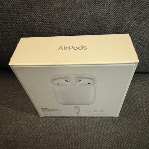 Apple Airpods (2 generasjon).  Trådløs in ear-hodetelefoner med Bloetooth.
