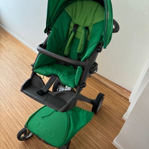 Stokke xplory (kun sportsdel) med regntrekk og handleveske