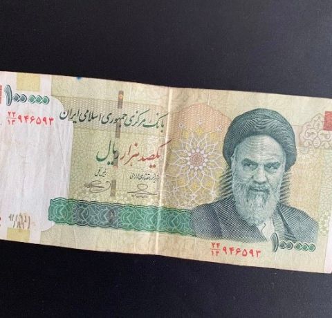 Iransk seddel «Bank Note» «100.000 Rials» selges.
