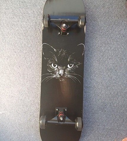 Black cat skateboard