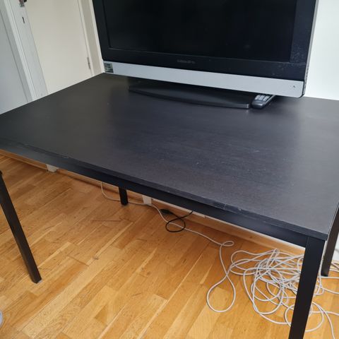 Black table in a good condition.