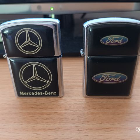 2 stk. Zippo cover (er lighter i Ford) byttes mot Volvo eller Politi cover