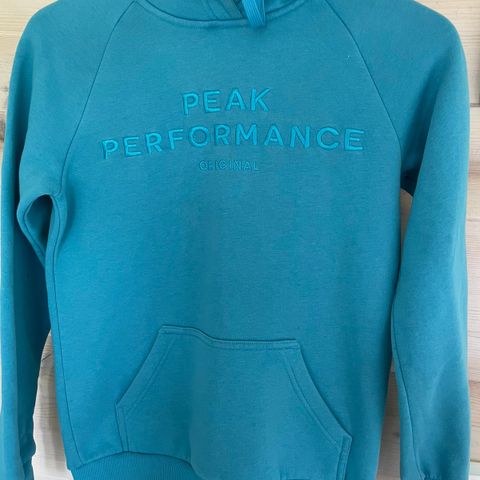 Peak Performance Hettegenser til dame i farve turkis str. XS