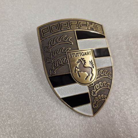 Porsche Panser emblem bronsefarget