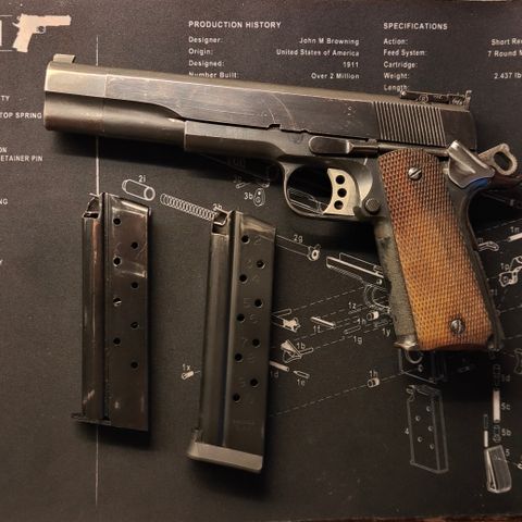 Colt 1911. 6" 9mm