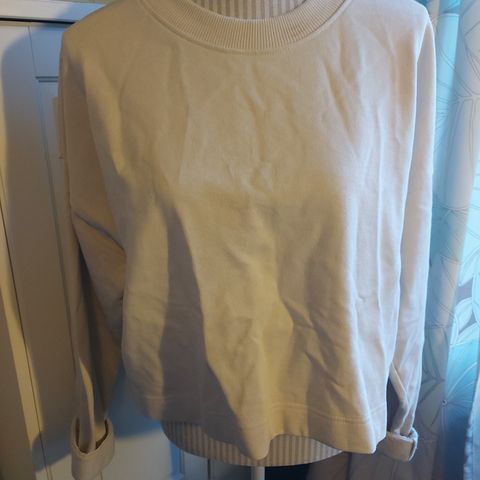 Lys beige college-genser fra H&M