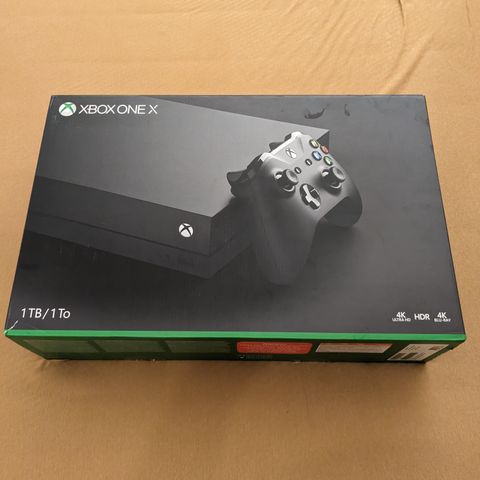 Xbox One X med 4 spill