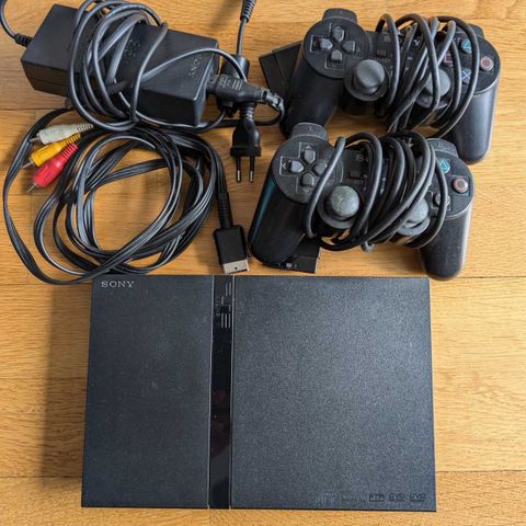 Playstation 2 slim med 4 spill