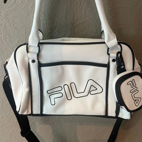 Bag fra fila