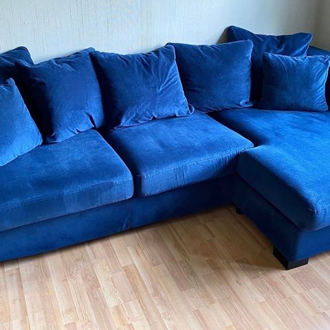 Blå velour sofa