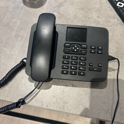 Bord telefon som brukes med sim kort