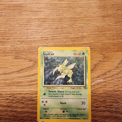 Scyther. 10/64. Rare holo. Jungle.