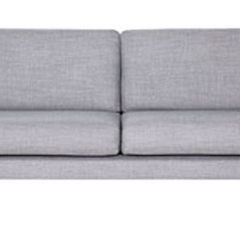 Elegant, retroinspirert sofa selges