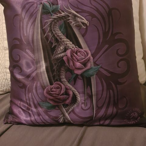 Purpel dragon decorating pillow