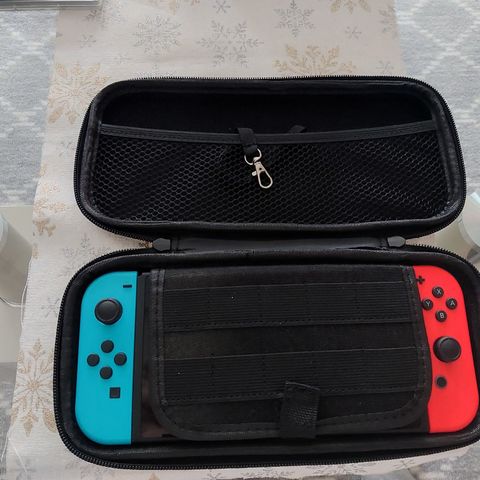 (NY PRIS) NINTENDO SWITCH MED SPILL