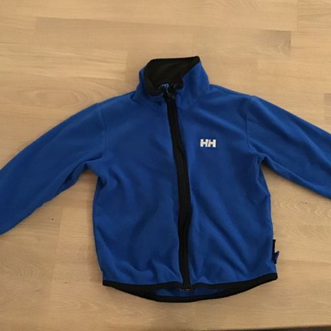 Helly Hansen flisjakke, str 6 år. Kr 40. Blå