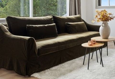 Grønn veloursofa